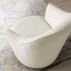 Nora Boucle Upholstered Swivel Chair in White